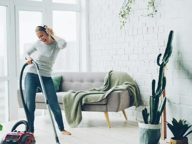 Vacuuming a bright living room